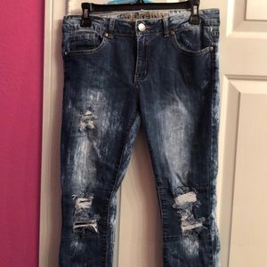 These are two toned blue holy jeans.